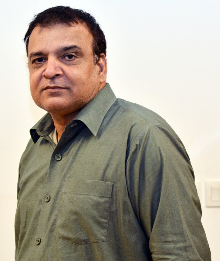 Portrait of Arshad Chaudhry, physics teacher